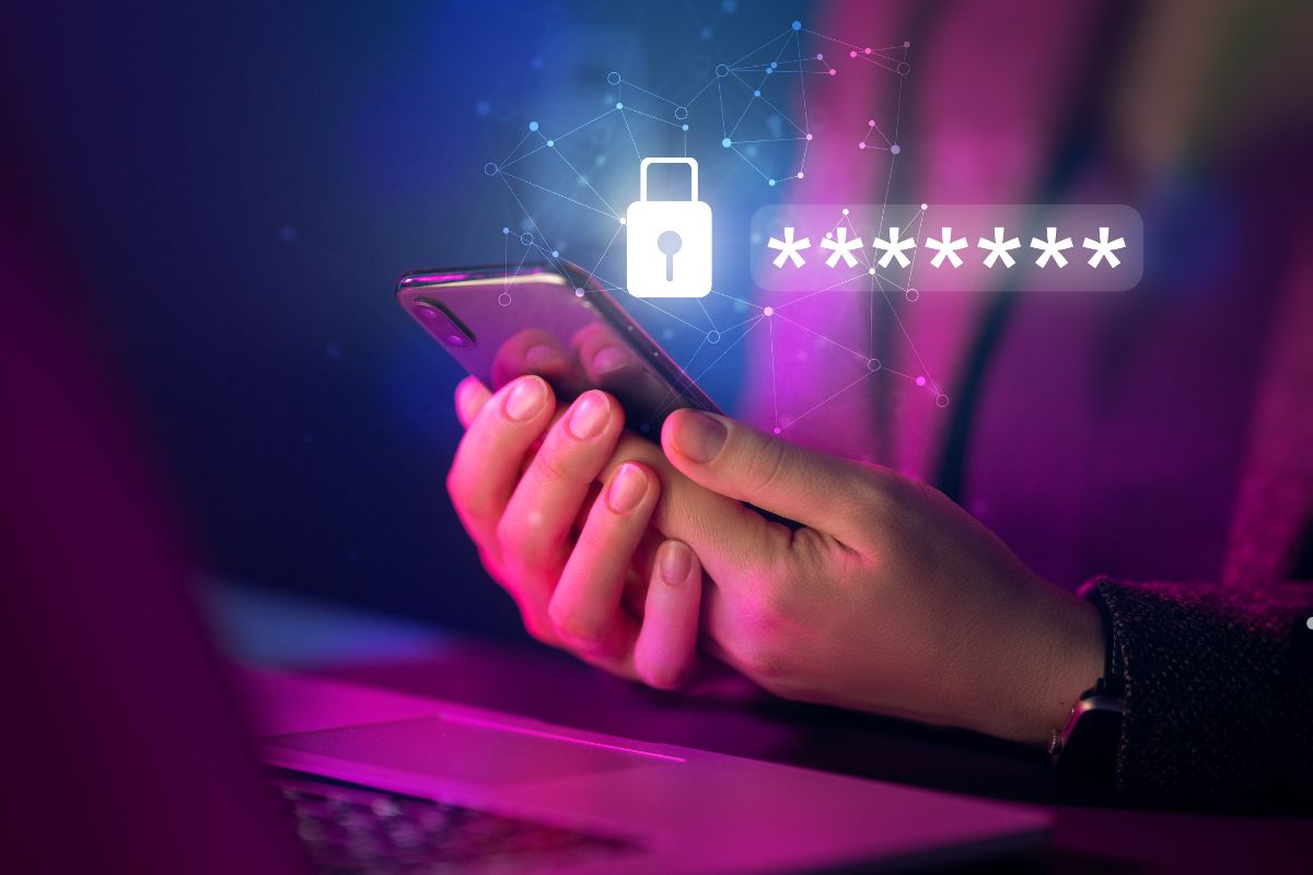A woman holding a smartphone displaying a padlock icon, indicating security or privacy features on the screen.
